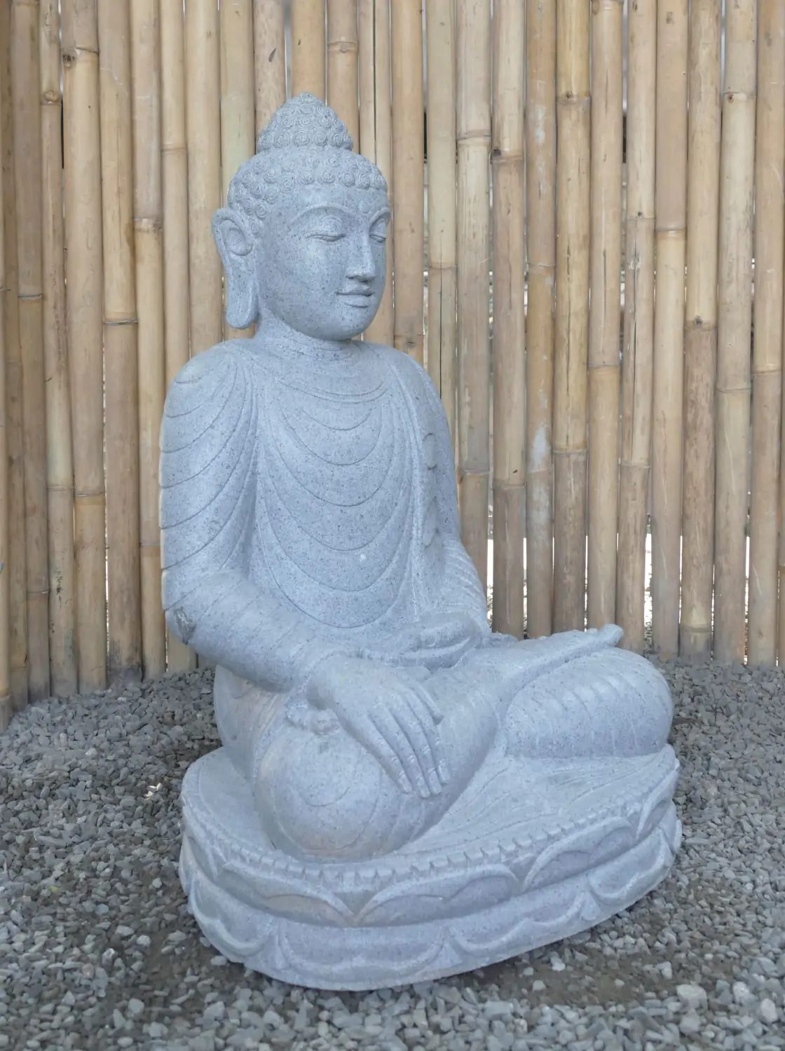  Product image 3 of the product “Seated Buddha made of Riverstone in Bhumisparsha - gesture of touching the earth. 82cm height. ”